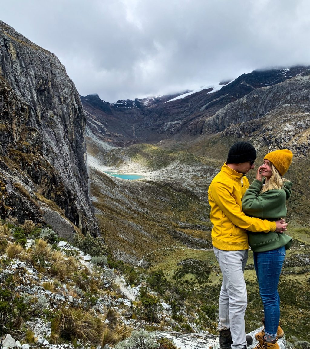 couple-embracing-on-scenic-mountain-top-2026-03-17-21-32-10-utc