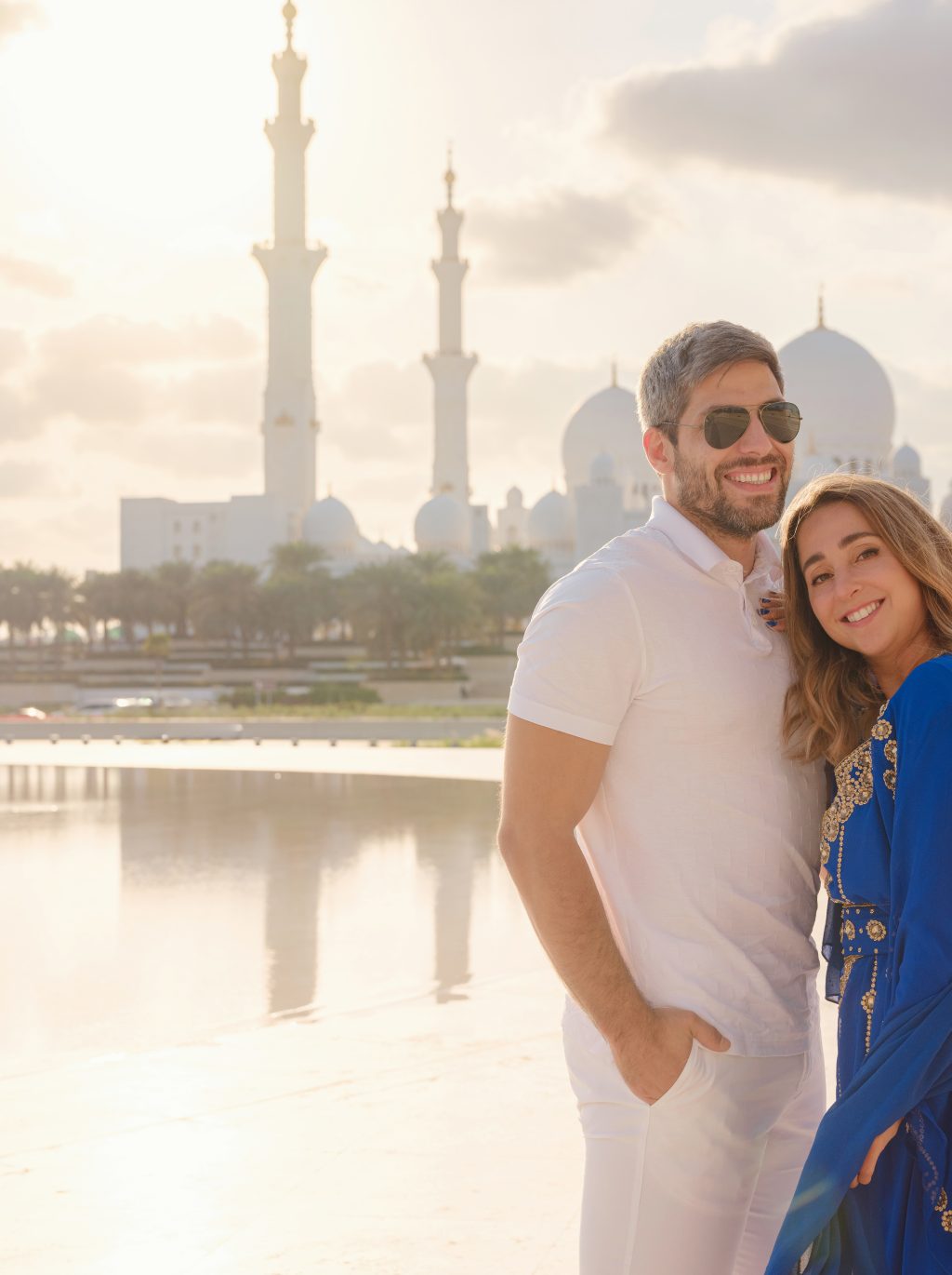 Travel to the United Arab Emirates, Abu Dhabi. Arab couple visiting the Grand Mosque in Abu Dhabi .